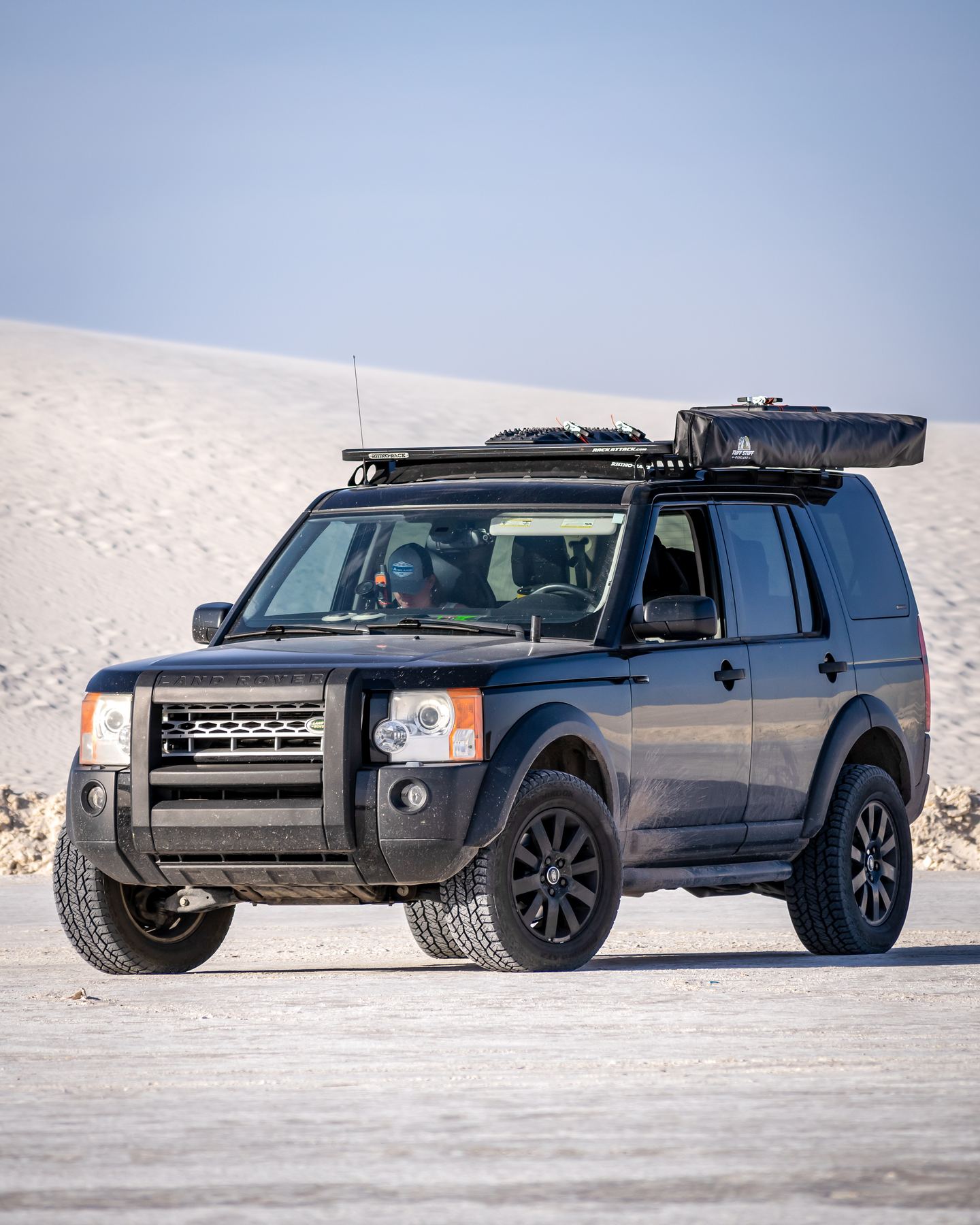 Landy on white sand