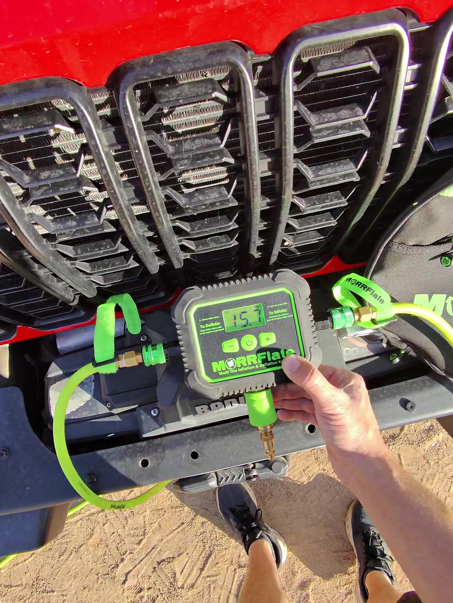 MORRFlate Air Hub digital air controller mounted on the front bumper of a red Jeep