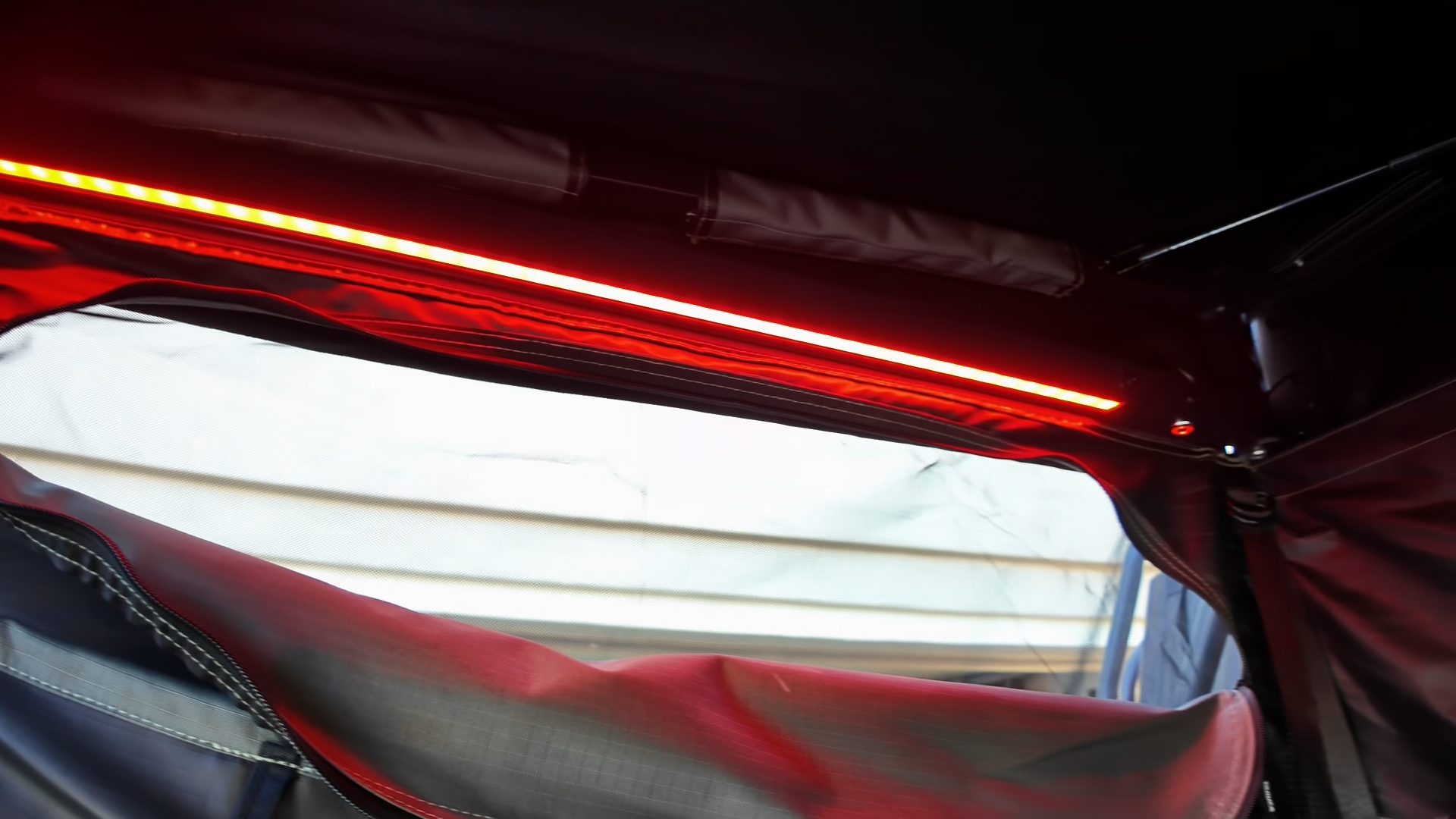 Red LED light bar glowing inside the Taruca ensuite