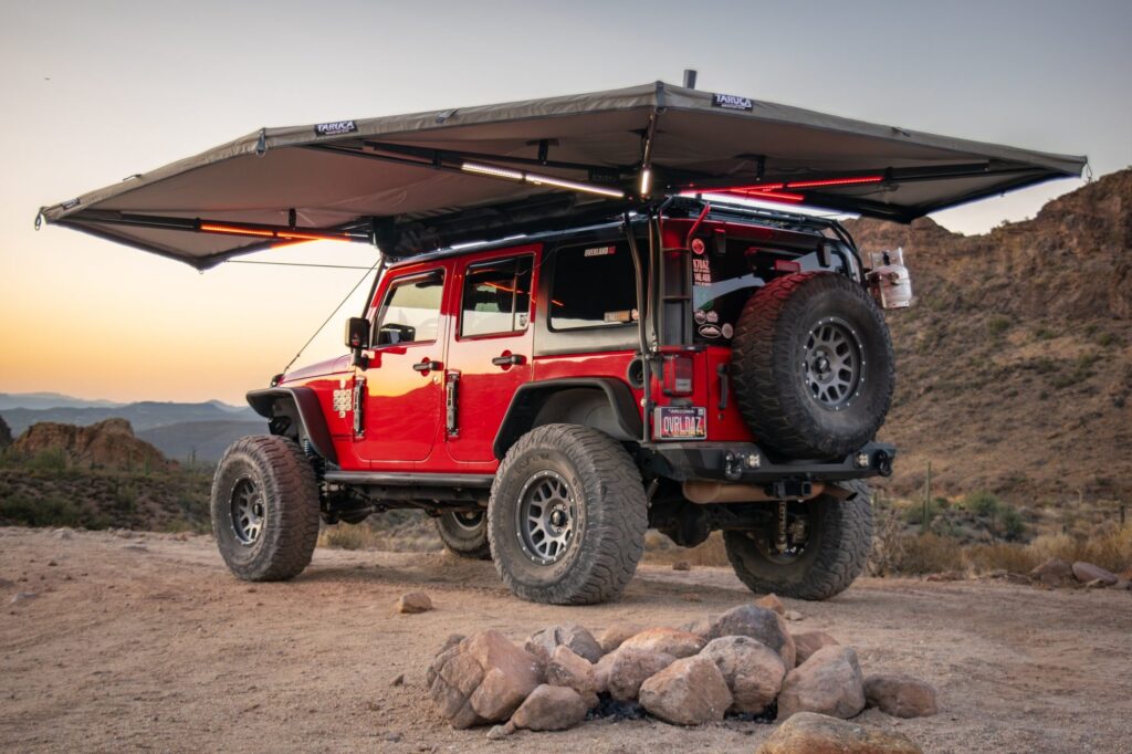 Clifford under the Taruca 270 XC awning at dusk